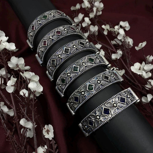 Quirky Fashions Oxidized Silver Bangles with Floral Carving – Traditional Pair in Red, Green, Blue, or Black Stone